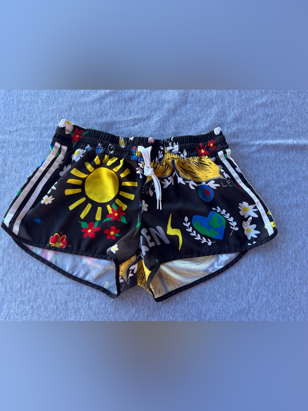 adidas Black Athletic Shorts with Yellow Sun & Multicolor Floral Graphics